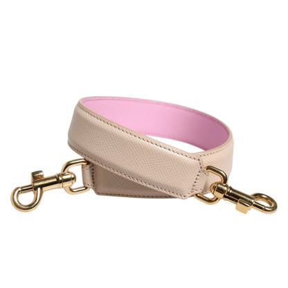 Shoulder Strap by Dolce & Gabbana for women in leather & metal beige, gold & pink showcases a enviable design, perfect for elevating any ensemble as part of the Leather Metal Shoulder Strap collection.