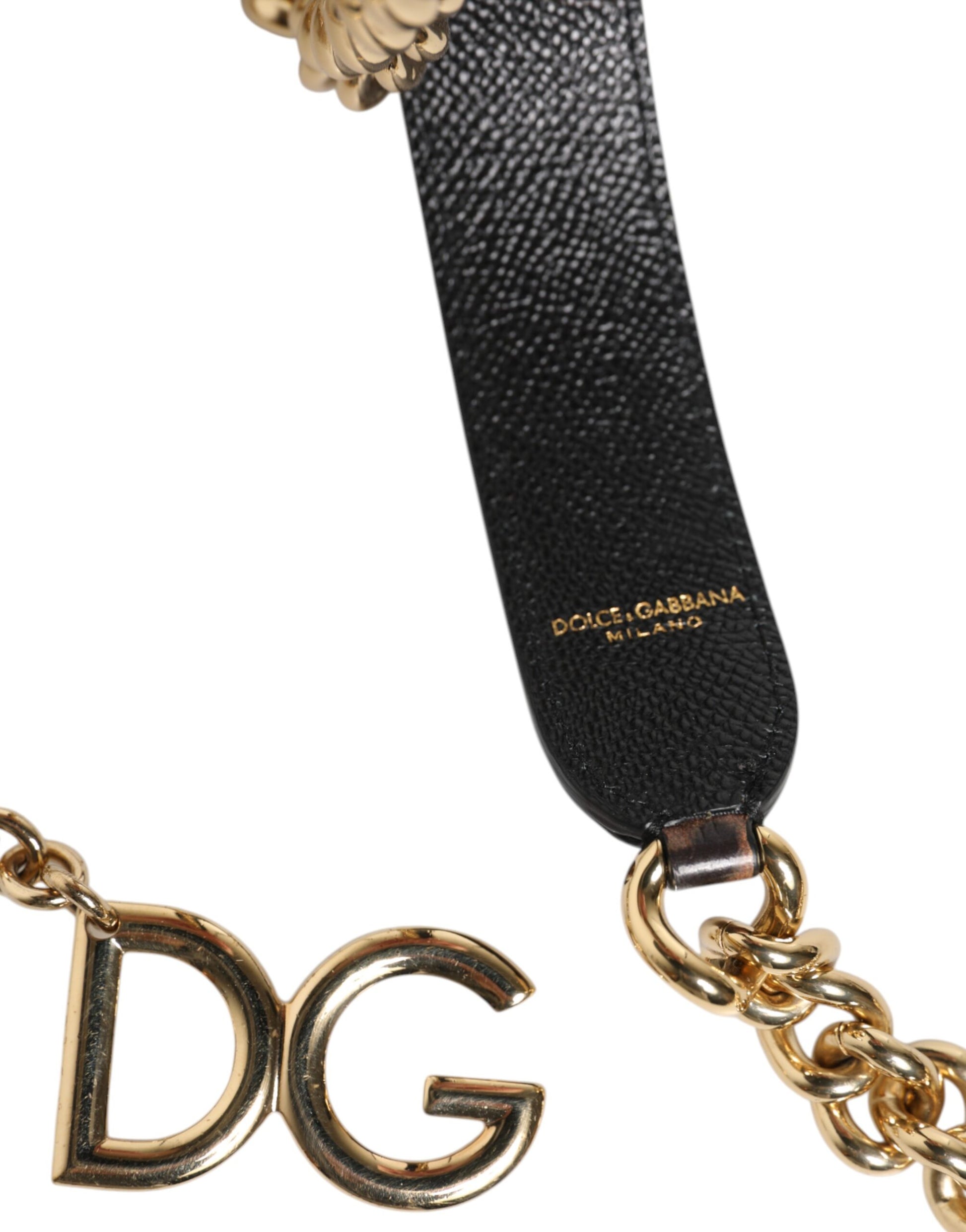 Shoulder Strap by Dolce & Gabbana for women in brass & calf leather brown & gold features a dynamic silhouette, artfully enhancing the dynamic design of this Brass Calf Leather Shoulder Strap.