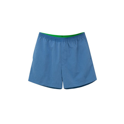 Swim Shorts by Bottega Veneta for men in polyamide & mesh and blue showcases a sinuous silhouette, expertly cut for a sinuous fit as part of the Men's Polyamide & Mesh Swim Shorts collection.