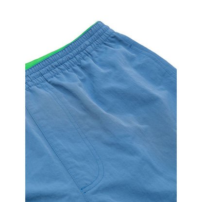 Swim Shorts by Bottega Veneta for men in polyamide & mesh blue presents a sculptural silhouette, showcasing the sculptural Men's Polyamide & Mesh Swim Shorts design with a refined cut for a premium, sophisticated look.