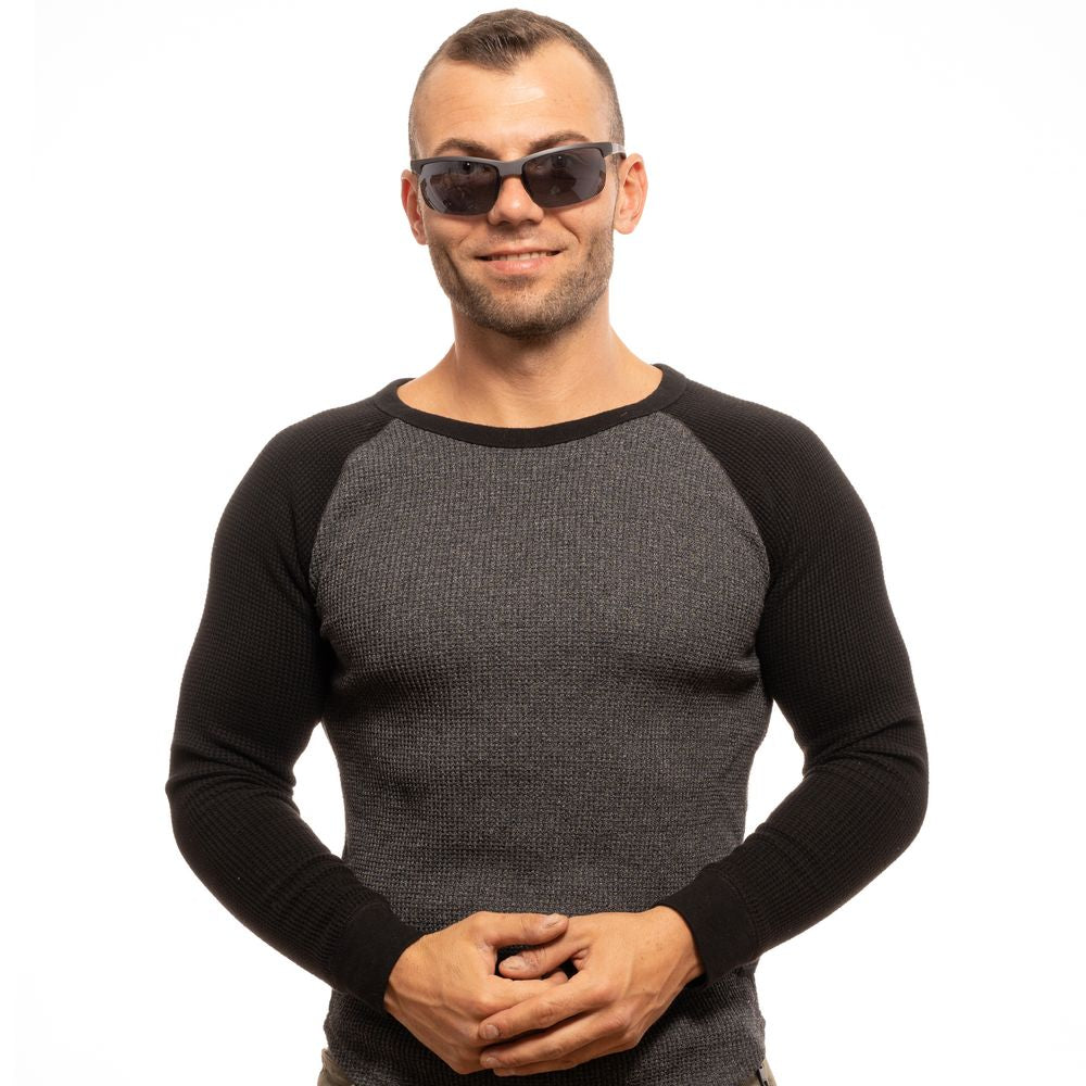Sunglasses by Fila for men in and black presents a sumptuous silhouette, featuring black coloured frame and rectangle frame design with non-polarized category-3-dark-tint lens for a sumptuous look.