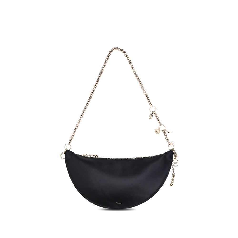 Shoulder Evening Clutch Bag by Chloé for women in bos taurus nappa leather black showcases a enviable silhouette, artfully detailed with a secure , organized , and versatile shoulder-strap & detachable-strap for a enviable look.