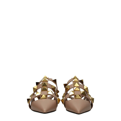 Flat Sandals by Valentino Garavani for women in leather and gold, pink & rose presents a captivating silhouette, showcasing the signature style of the Women's Leather Flat Sandals with a captivating flat and captivating .