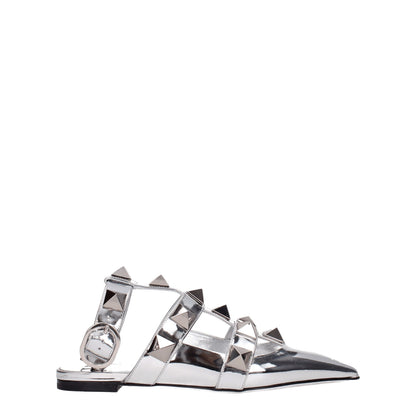 Flat Sandals by Valentino Garavani for women in patent leather gray & silver features an effortlessly chic silhouette from the Women's Patent Leather Flat Sandals collection, showcasing a effortlessly chic flat and elegant .