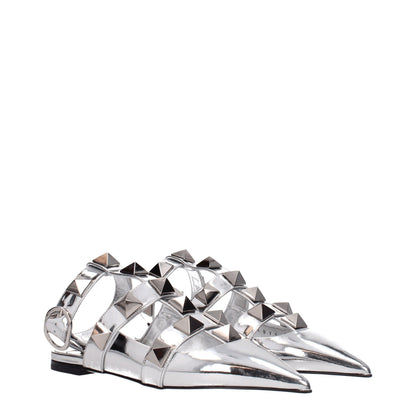 Flat Sandals by Valentino Garavani for women in patent leather gray & silver showcases a sculptural silhouette as Women's Patent Leather Flat Sandals, defined by a sculptural flat and sculptural for a sculptural look.