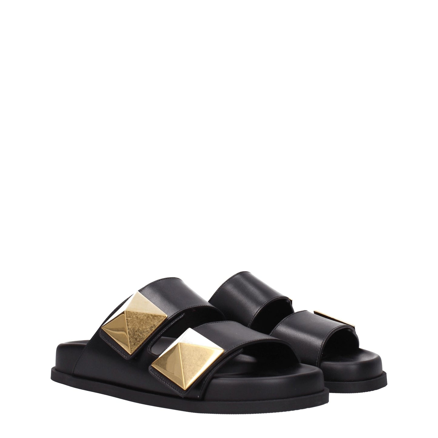Flat Clogs Sandals by Valentino Garavani for women in leather & rubber and black presents a captivating silhouette, showcasing the signature style of the Women's Leather & Rubber Flat Clogs Sandals with a captivating flat and captivating open toe style.