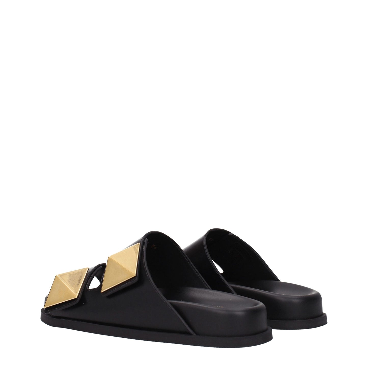 Flat Clogs Sandals by Valentino Garavani for women in leather & rubber black features an exquisite silhouette, showcasing the exquisite Women's Leather & Rubber Flat Clogs Sandals with a flat and open toe style.