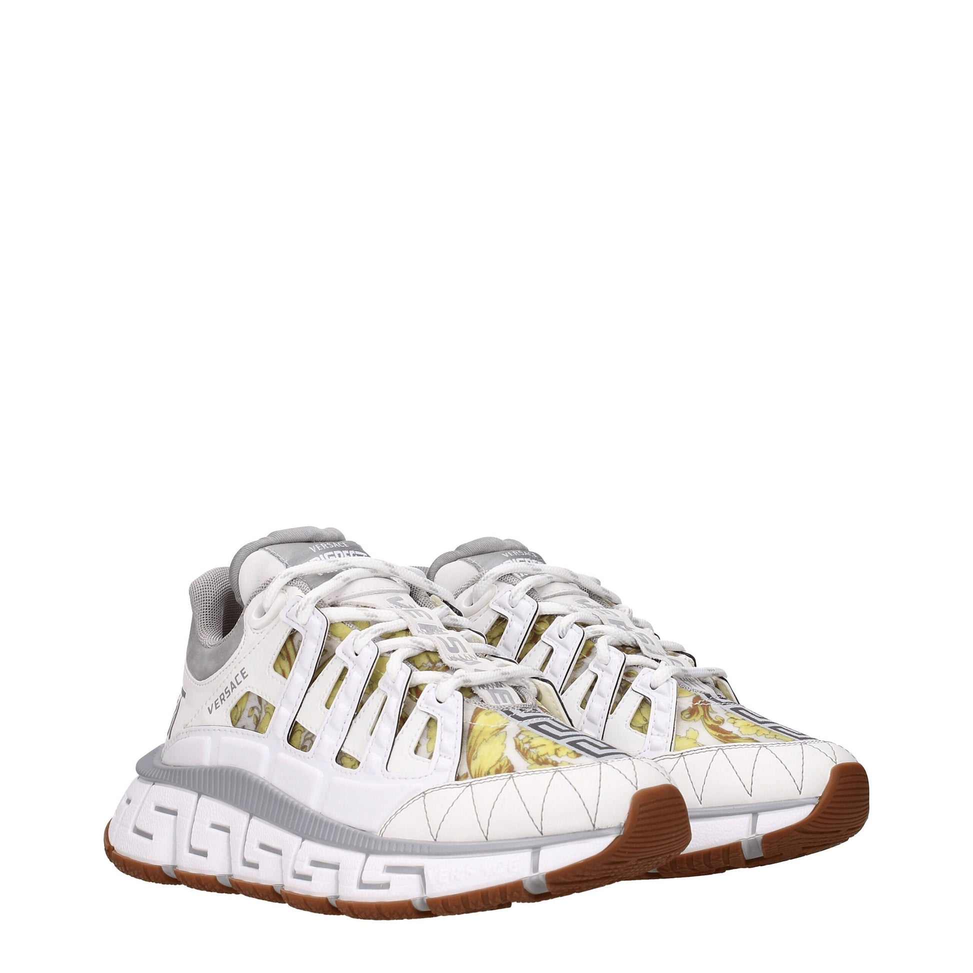 Sneakers by Versace for women in leather & rubber gray & white features an timeless silhouette from the Women's Fashion Leather & Rubber Sneakers collection, showcasing a signature fashion style with an timeless finish.
