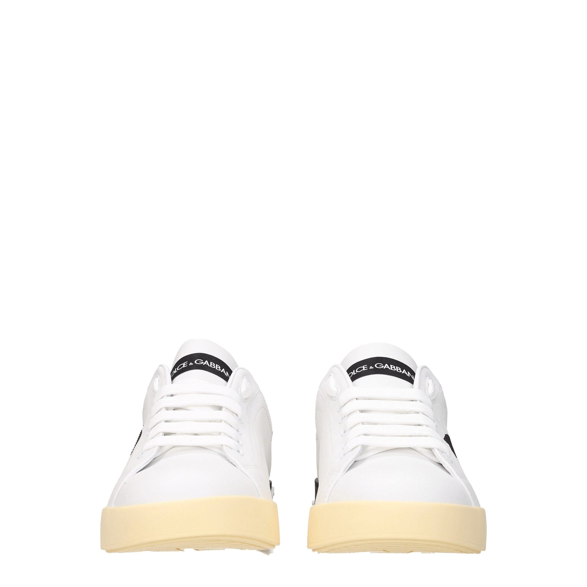 Sneakers by Dolce & Gabbana for men in leather & rubber black & white presents a impeccable silhouette as Men's Low Top Leather & Rubber Sneakers, expertly defined by a impeccable low-top style for a impeccable, high-fashion look.