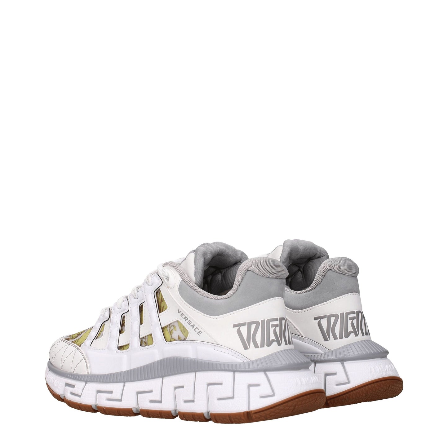 Sneakers by Versace for women in leather & rubber gray & white presents a sumptuous silhouette, artfully capturing the essence of the Women's Fashion Leather & Rubber Sneakers with its sumptuous fashion style design.