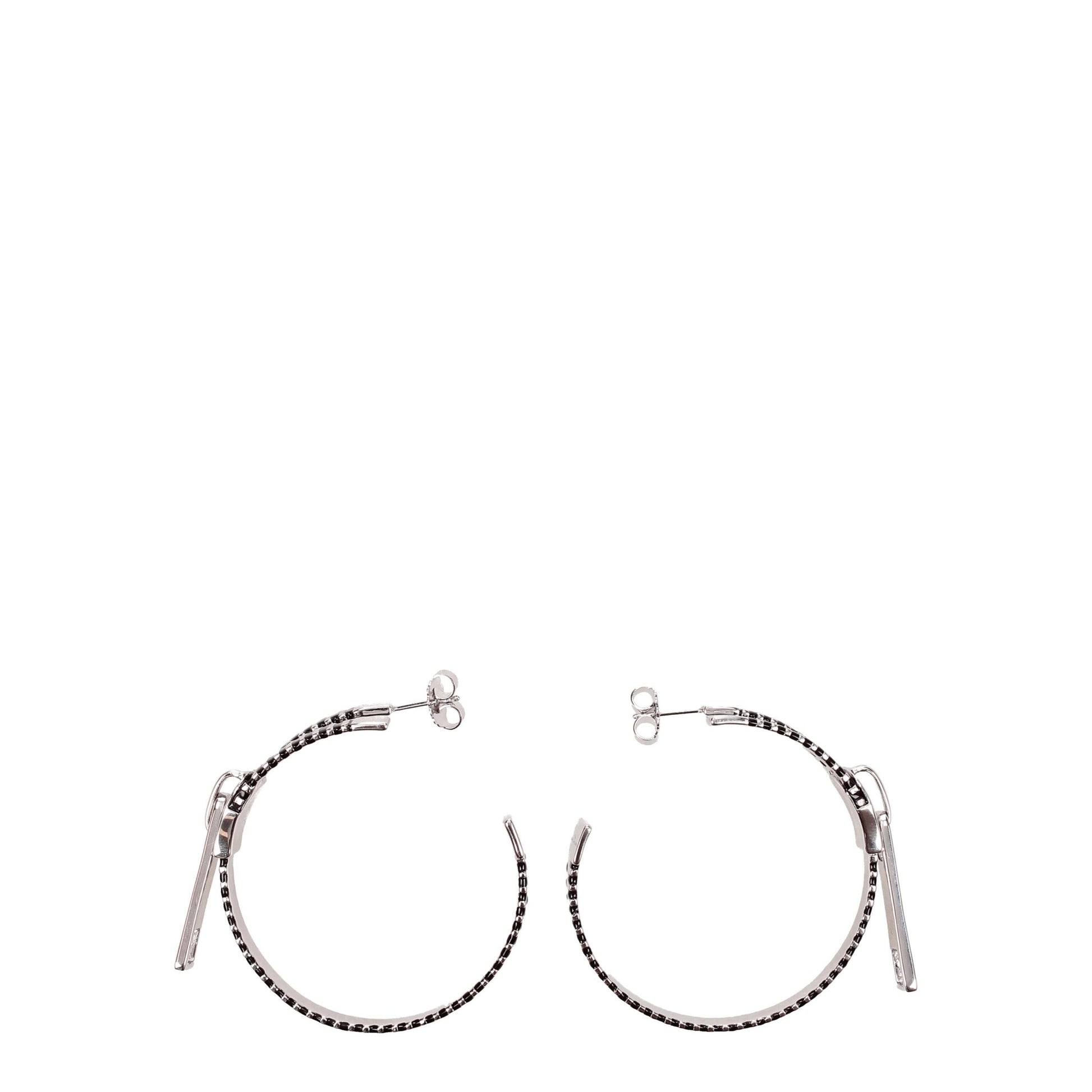 Earrings by Marc Jacobs for women in polyamide gray & silver showcases a enchanting silhouette, artfully incorporating the intricate seen in the Women's Silver Earrings.