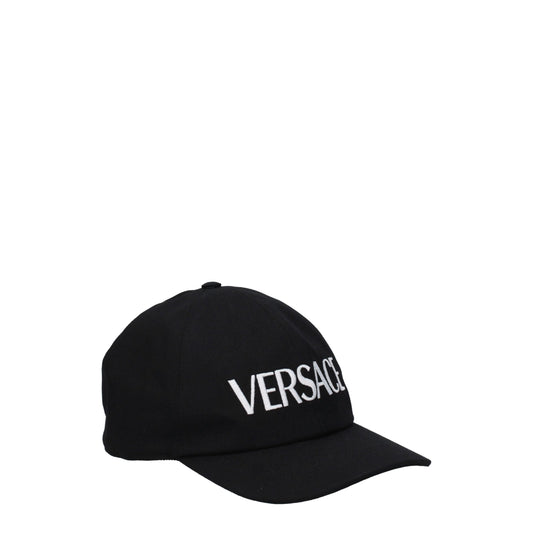Hat by Versace for women in cotton black & white features an exquisite silhouette, showcasing the exquisite craftsmanship of this Cotton Hat.