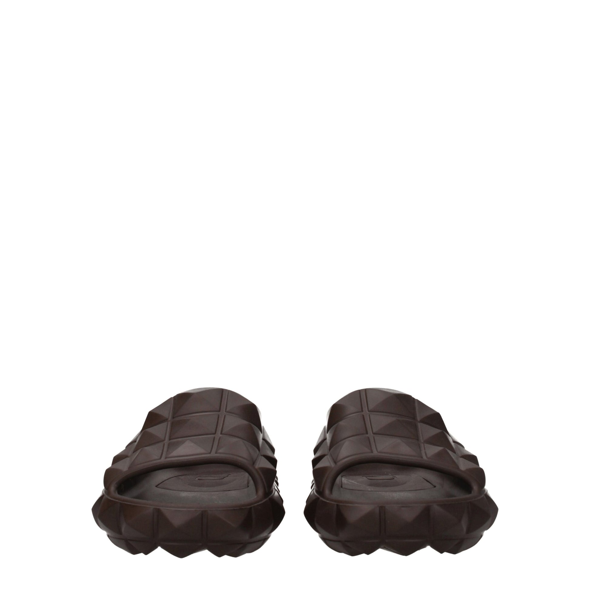 Mid-Heel Clogs Sandals by Valentino Garavani for men in cotton & rubber brown features an exquisite silhouette, showcasing the exquisite Men's Cotton & Rubber Mid-Heel Clogs Sandals with a 4-cm-heel mid-heel and open toe style.
