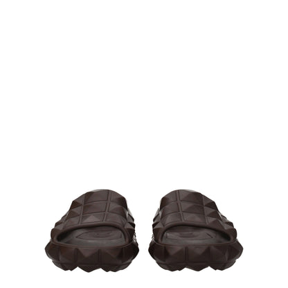 Mid-Heel Clogs Sandals by Valentino Garavani for men in cotton & rubber brown features an exquisite silhouette, showcasing the exquisite Men's Cotton & Rubber Mid-Heel Clogs Sandals with a 4-cm-heel mid-heel and open toe style.