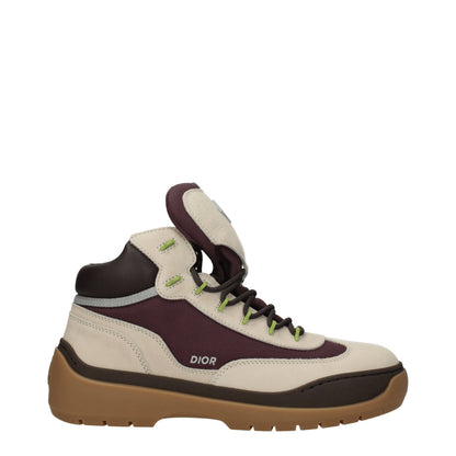 Mid-Heel Lace-Up Ankle Boots by Christian Dior for men in suede leather & rubber beige & brown showcases a impeccable silhouette as Men's Suede Leather & Rubber Mid-Heel Lace-Up Ankle Boots, artfully defined by a impeccable 4-5-cm-heel mid-heel and a impeccable round toe style.