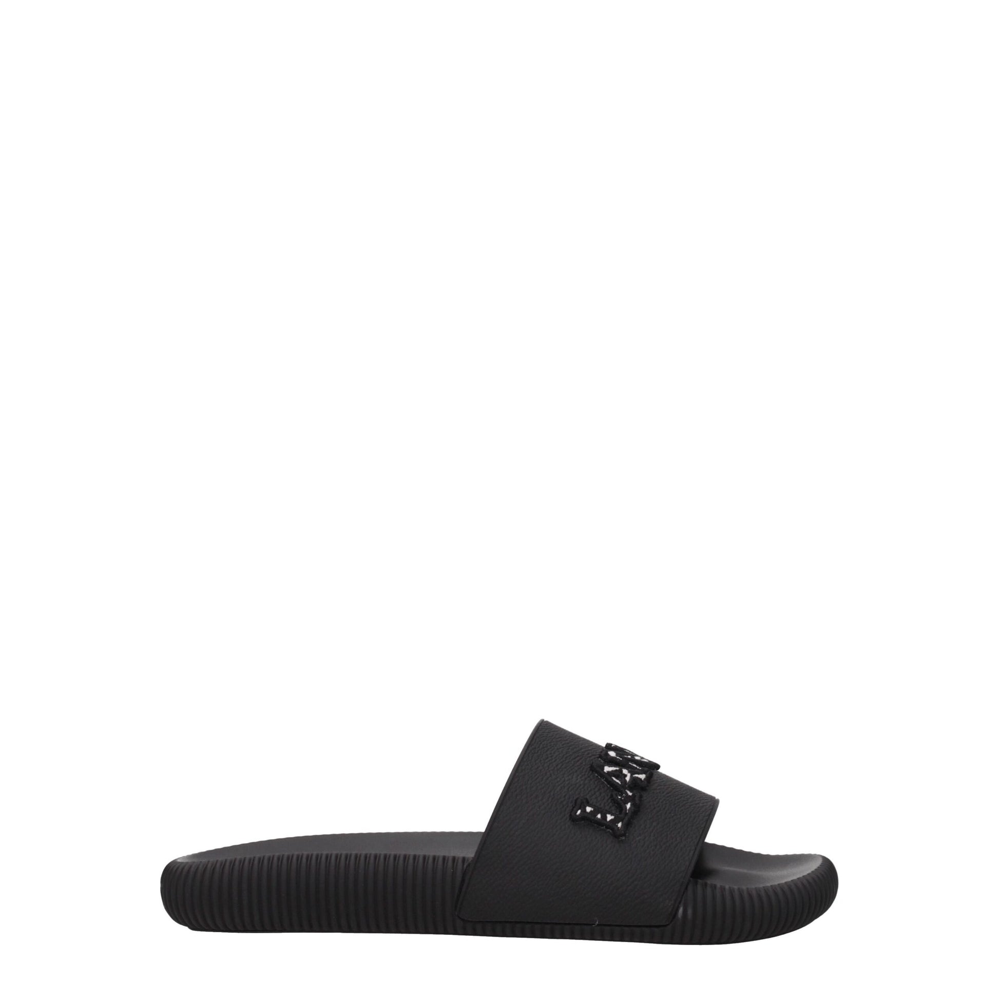 Flat Clogs Sandals by Lanvin for women in cotton & rubber black showcases a sculptural silhouette as Women's Cotton & Rubber Flat Clogs Sandals, defined by a sculptural flat and sculptural open toe style for a sculptural look.