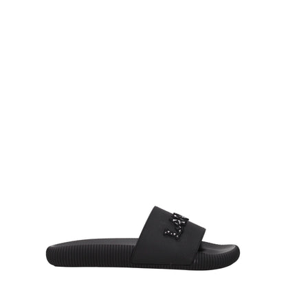 Flat Clogs Sandals by Lanvin for women in cotton & rubber black showcases a sculptural silhouette as Women's Cotton & Rubber Flat Clogs Sandals, defined by a sculptural flat and sculptural open toe style for a sculptural look.