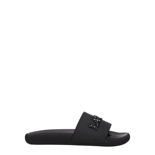 Flat Clogs Sandals by Lanvin for women in cotton & rubber black showcases a sculptural silhouette as Women's Cotton & Rubber Flat Clogs Sandals, defined by a sculptural flat and sculptural open toe style for a sculptural look.