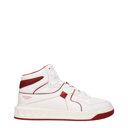 Sneakers by Valentino Garavani for men in leather & rubber red & white features an fashionable silhouette, showcasing the premium Men's High Top Leather & Rubber Sneakers in a fashionable high-top style that offers a fashionable finish for refined style.