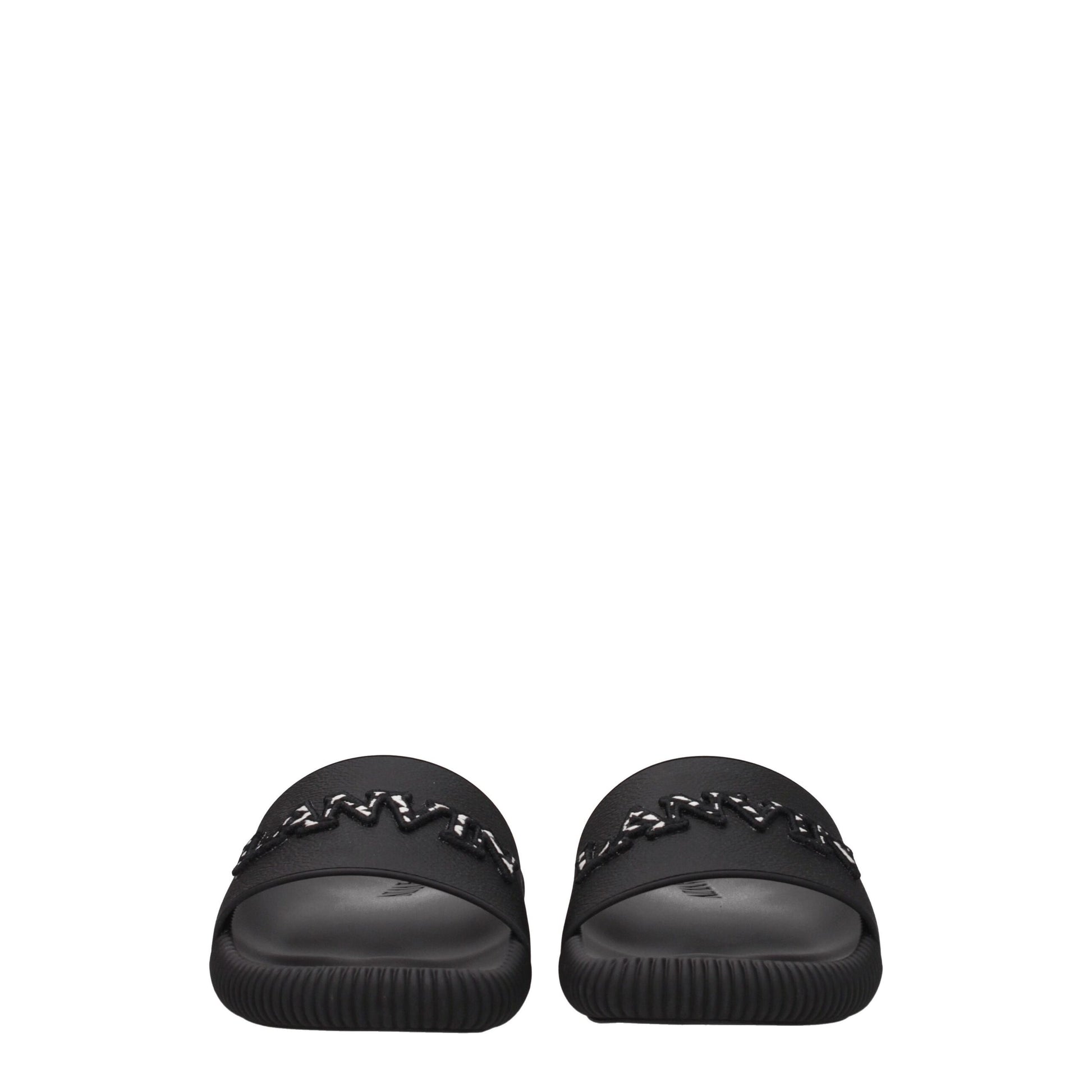 Flat Clogs Sandals by Lanvin for women in cotton & rubber black features an effortlessly chic silhouette from the Women's Cotton & Rubber Flat Clogs Sandals collection, showcasing a effortlessly chic flat and elegant open toe style.
