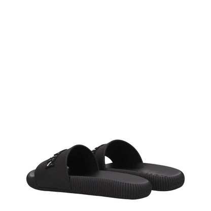 Flat Clogs Sandals by Lanvin for women in cotton & rubber black presents a sculptural silhouette, showcasing the Women's Cotton & Rubber Flat Clogs Sandals design with a sculptural flat and open toe style for a premium look.