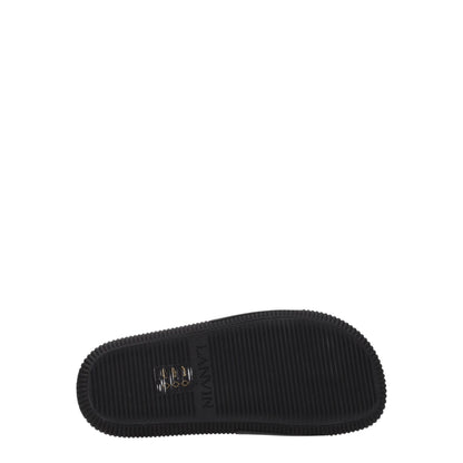 Flat Clogs Sandals by Lanvin for women in cotton & rubber black features an statuesque Women's Cotton & Rubber Flat Clogs Sandals silhouette with a refined flat and elegant open toe style.