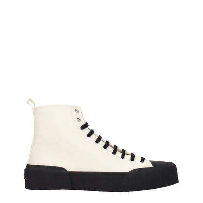 Sneakers by Jil Sander for men in rubber & fabric beige & black presents a on trend silhouette from the Men's Fashion Rubber & Fabric Sneakers collection, showcasing a on trend fashion style for an elevated aesthetic.