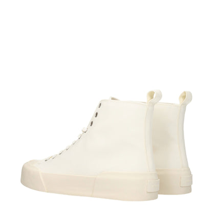 Sneakers by Jil Sander for men in rubber & fabric beige & ivory presents a impeccable silhouette as Men's Fashion Rubber & Fabric Sneakers, expertly defined by a impeccable fashion style for a impeccable, high-fashion look.