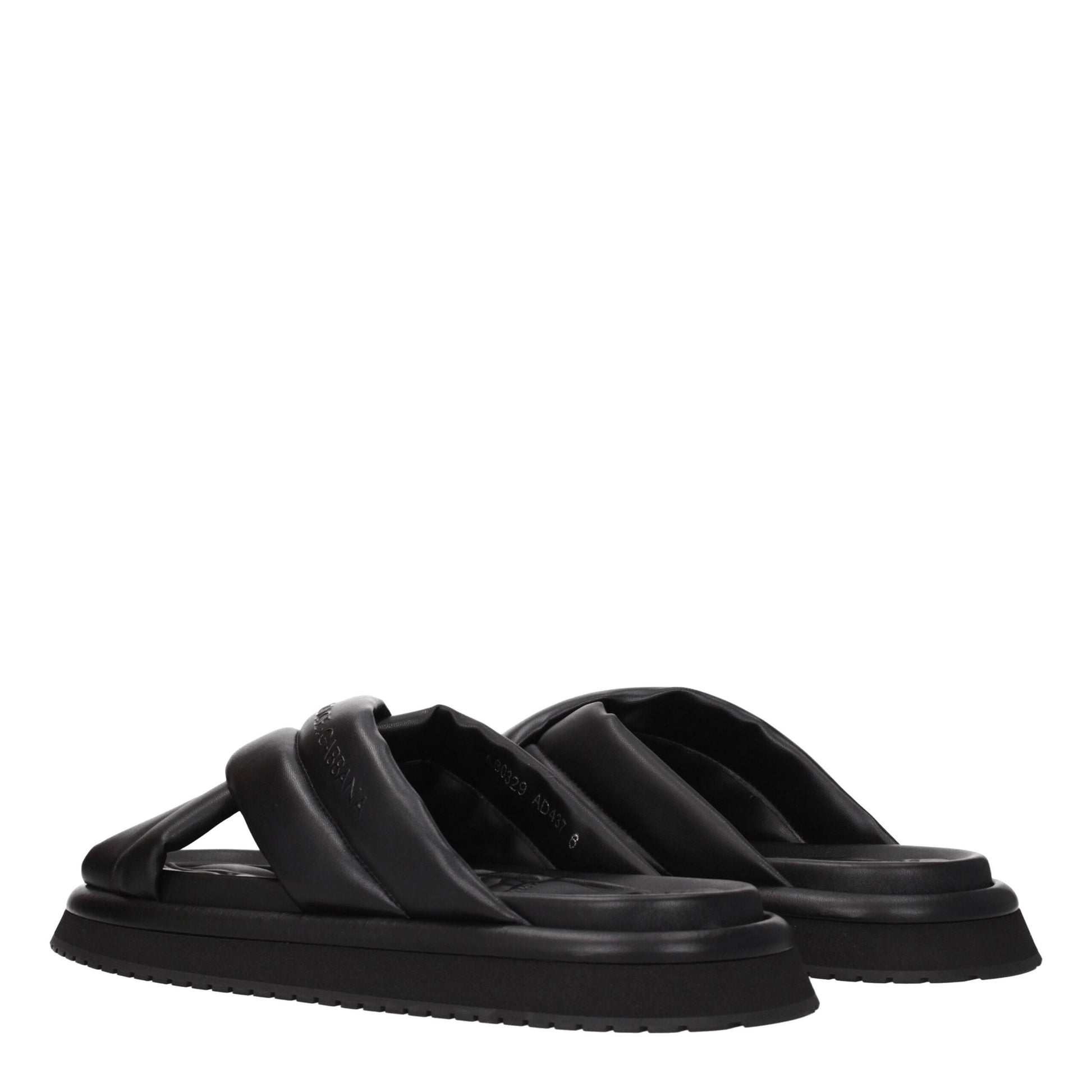 Flat Clogs Slippers from Dolce & Gabbana for men in leather & rubber black features a dynamic design from the Men's Leather & Rubber Flat Clogs Slippers collection, highlighting a with a and functional .