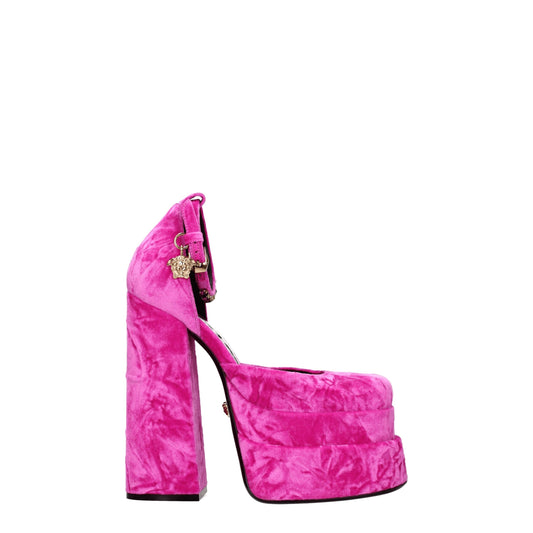 High-Heel Platform Sandals by Versace for women in leather & rhinestone fuchsia, gold & pink features an architectural design from the Women's Leather & Rhinestone High-Heel Platform Sandals collection, defined by a architectural high-heel platform and square toe style for a architectural finish.