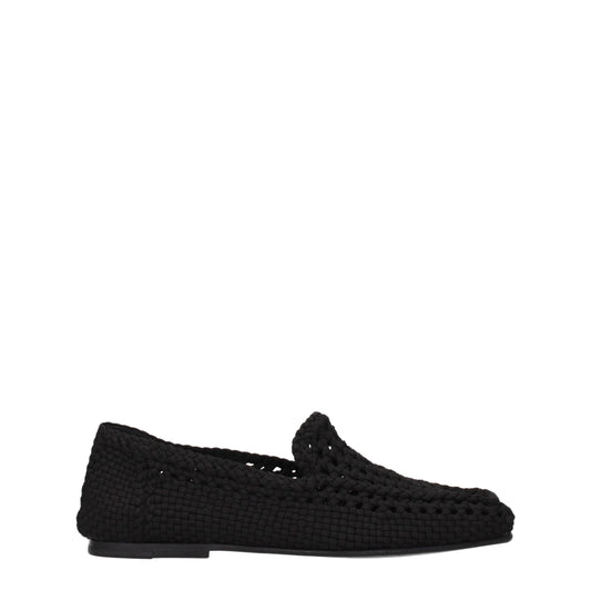 Flat Loafer Slip-On Shoes by Dolce & Gabbana for men in leather black features an effortless chic silhouette, showcasing the Men's Leather Flat Loafer Slip-On Shoes design with an effortless chic flat and a round toe style for a effortless chic look.