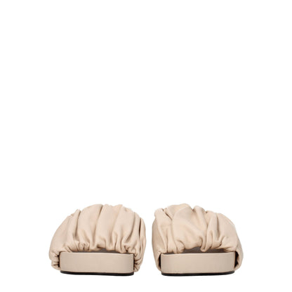 Mid-Heel Clogs Sandals by Jil Sander for women in leather powder-pink presents a sculptural silhouette, showcasing the Women's Leather Mid-Heel Clogs Sandals design with a sculptural 4-5-cm-heel mid-heel and open toe style for a premium look.