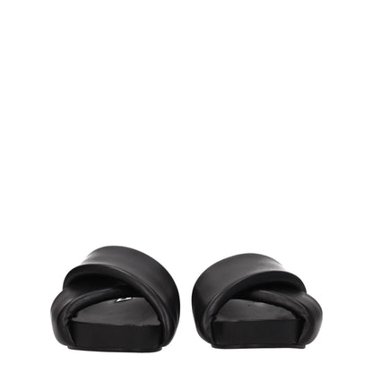 Mid-Heel Clogs Sandals by Jil Sander for women in leather black features an statuesque Women's Leather Mid-Heel Clogs Sandals silhouette with a refined 4-cm-heel mid-heel and elegant open toe style.