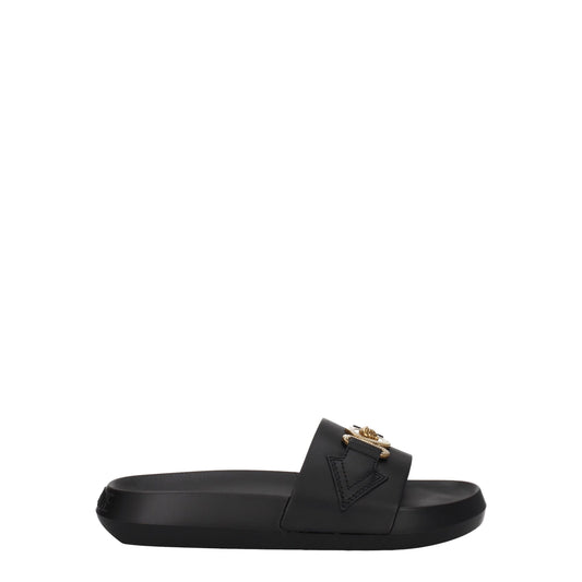 Flat Clogs Sandals by Versace for women in leather & rubber black & gold features an effortlessly chic silhouette from the Women's Leather & Rubber Flat Clogs Sandals collection, showcasing a effortlessly chic flat and elegant open toe style.