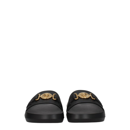 Flat Clogs Sandals by Versace for women in black & gold features an statuesque Women's Leather & Rubber Flat Clogs Sandals silhouette with a refined flat and elegant open toe style.