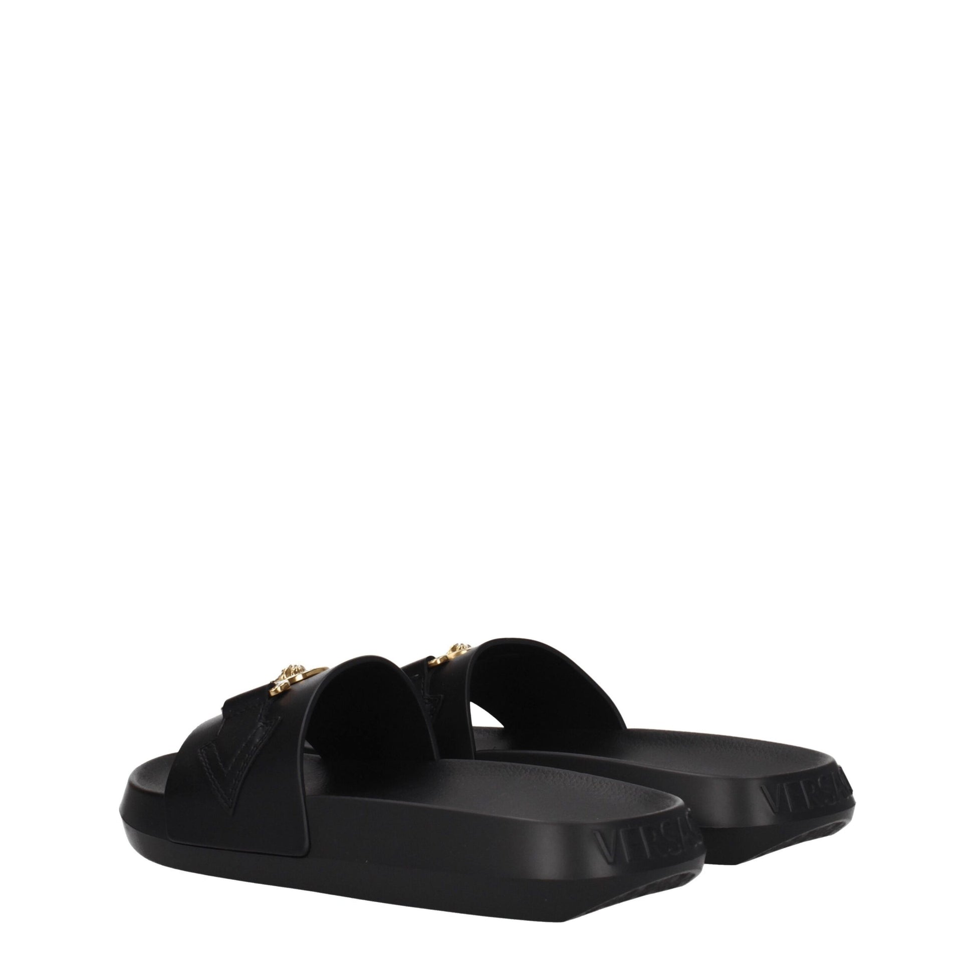 Flat Clogs Sandals by Versace for women in and black & gold presents a captivating silhouette, showcasing the signature style of the Women's Leather & Rubber Flat Clogs Sandals with a captivating flat and captivating open toe style.