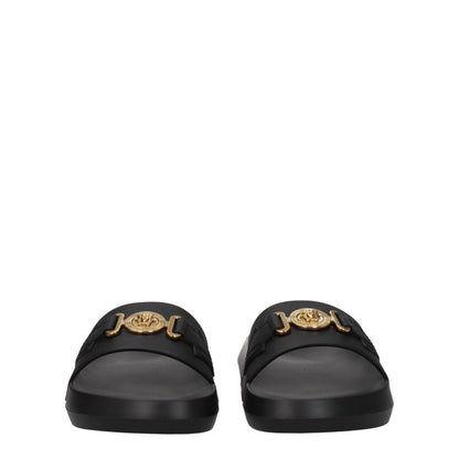 Flat Clogs Sandals by Versace for men in leather & rubber black & gold features an exquisite silhouette, showcasing the exquisite Men's Leather & Rubber Flat Clogs Sandals with a flat and open toe style.