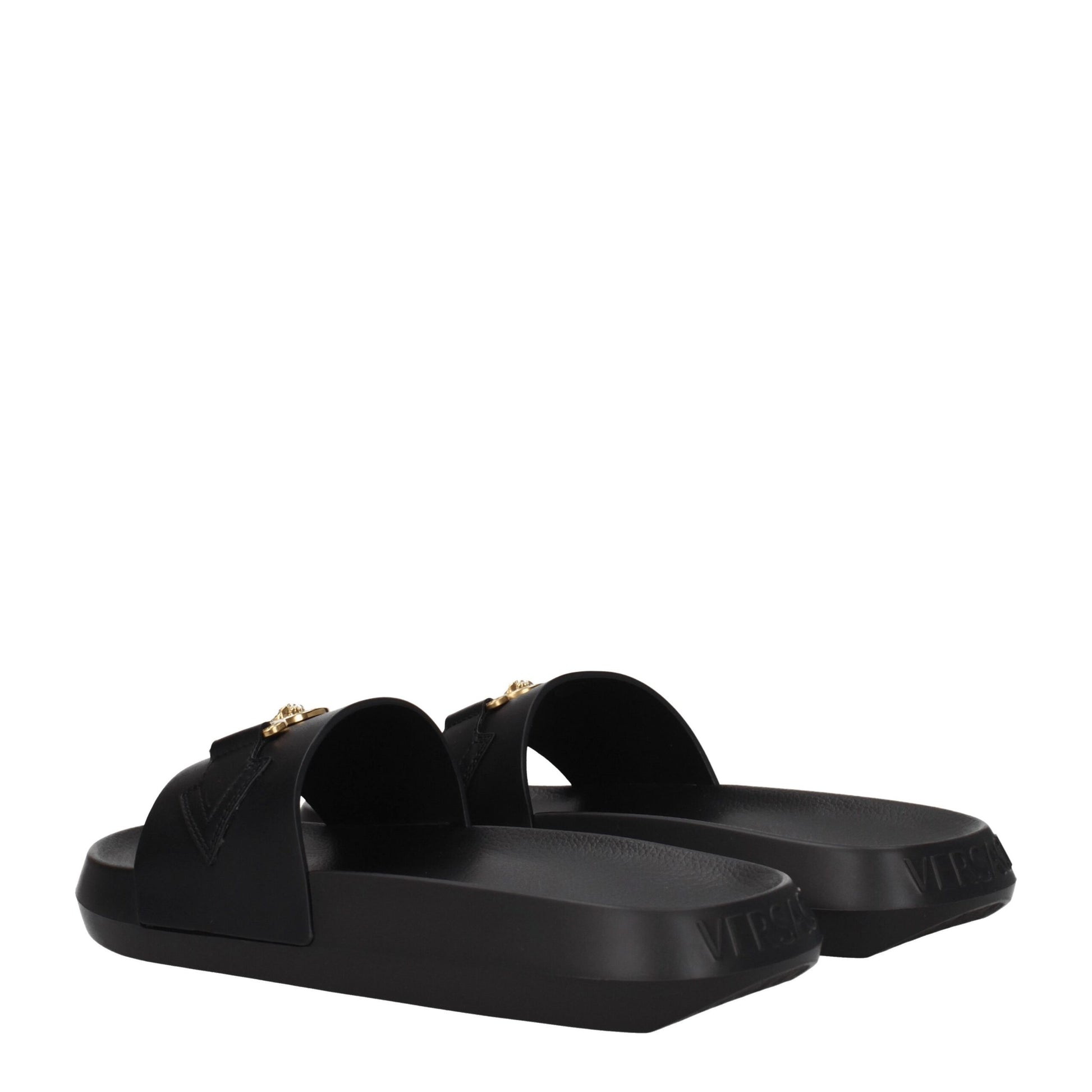 Flat Clogs Sandals by Versace for men in leather & rubber black & gold features an architectural design from the Men's Leather & Rubber Flat Clogs Sandals collection, defined by a architectural flat and open toe style for a architectural finish.