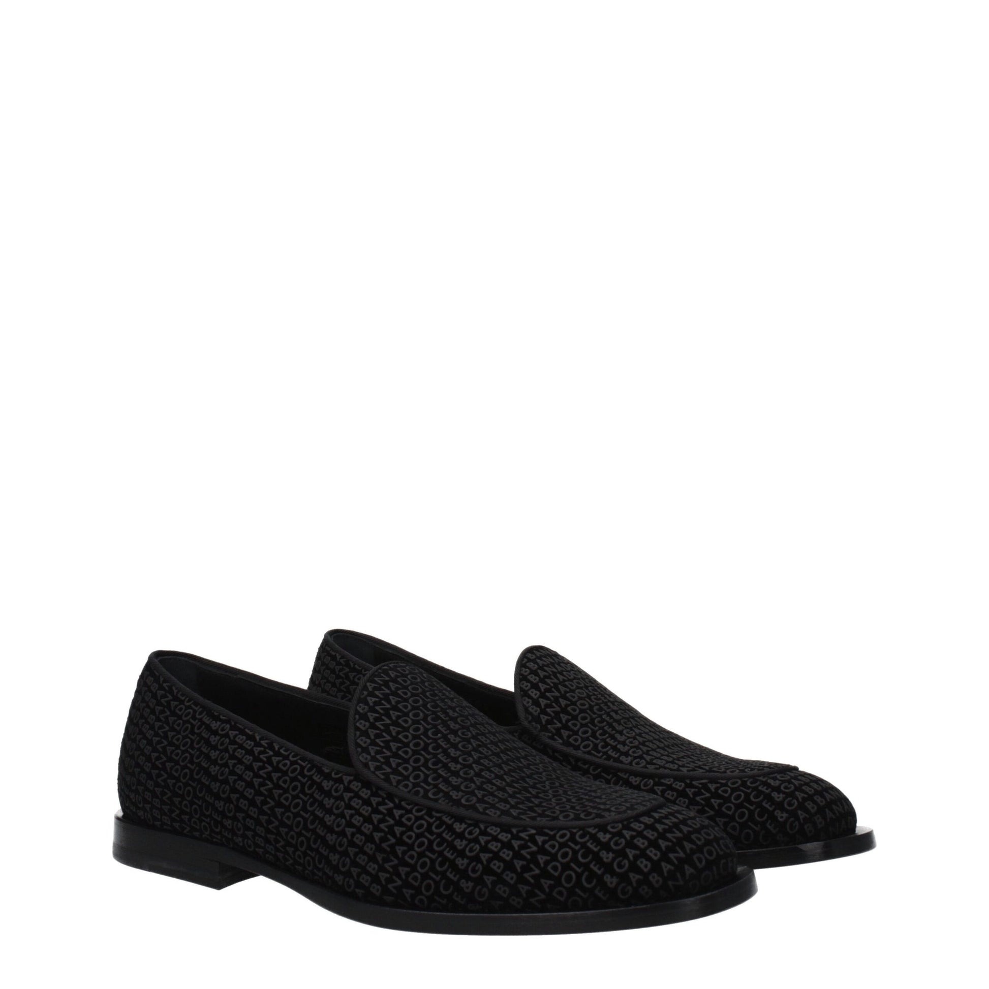 This Flat Loafer Slip-On Shoes by Dolce & Gabbana for men in leather & velvet black features an exquisite silhouette from the Men's Leather & Velvet Flat Loafer Slip-On Shoes collection, defined by a sophisticated flat and elegant round toe style.