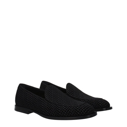 This Flat Loafer Slip-On Shoes by Dolce & Gabbana for men in leather & velvet black features an exquisite silhouette from the Men's Leather & Velvet Flat Loafer Slip-On Shoes collection, defined by a sophisticated flat and elegant round toe style.