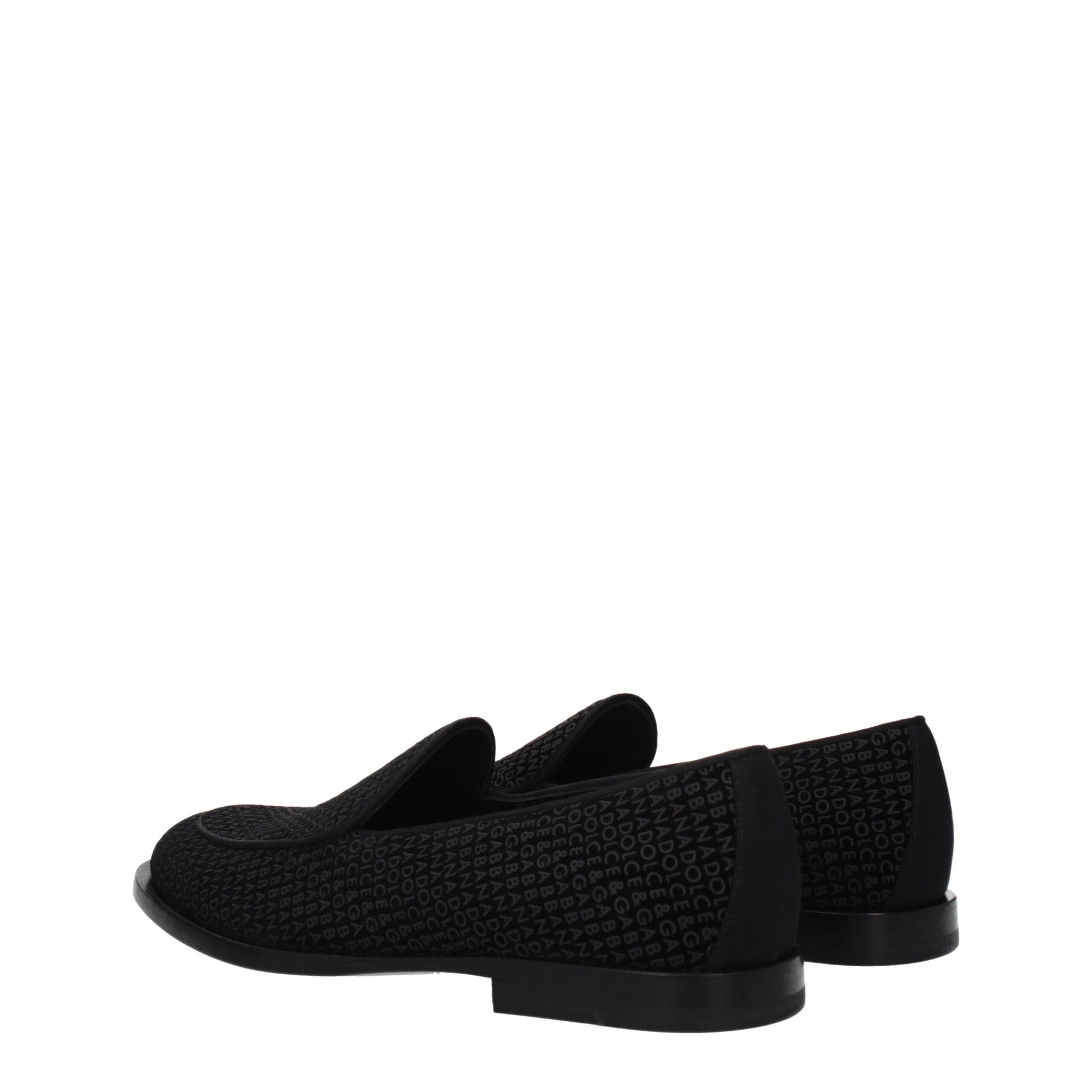 Flat Loafer Slip-On Shoes by Dolce & Gabbana for men in black showcases a impeccable silhouette as Men's Leather & Velvet Flat Loafer Slip-On Shoes, artfully designed with a impeccable flat and refined round toe style for a impeccable finish.