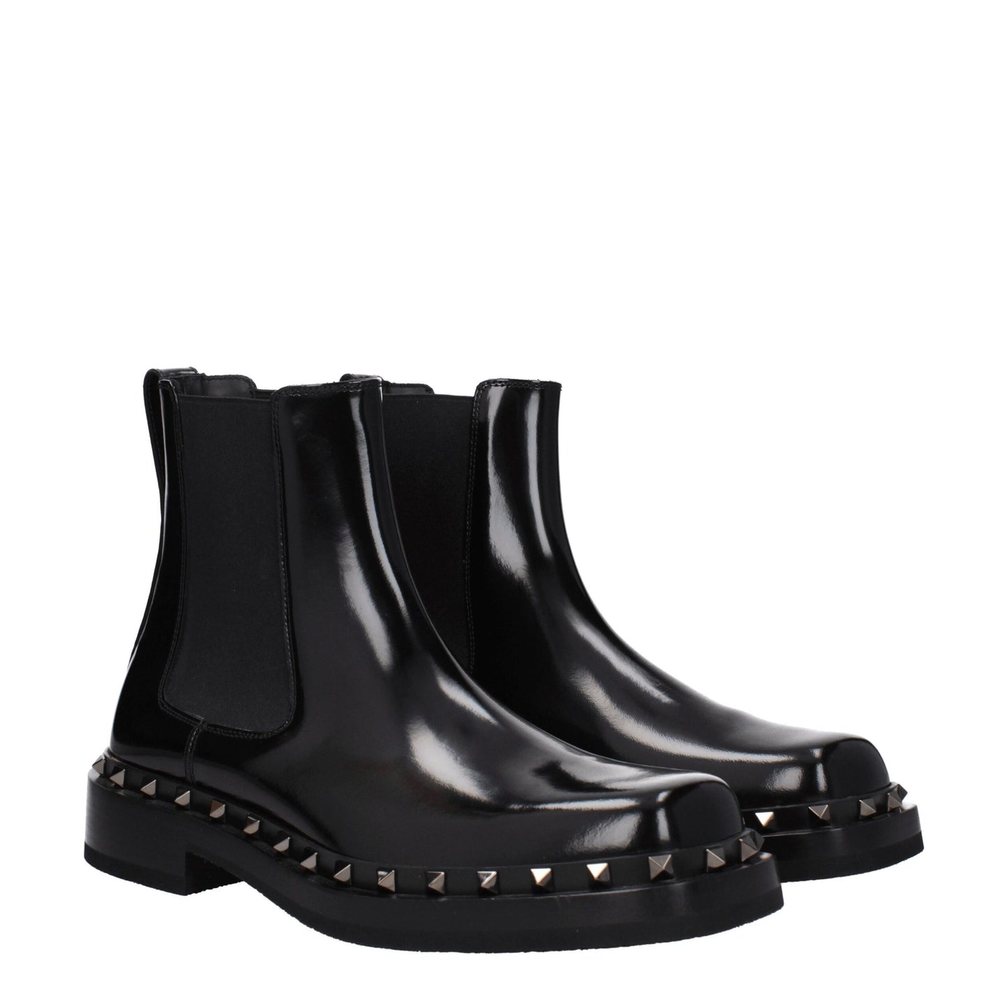 Low-Heel Ankle Boots by Valentino Garavani for men in leather & rubber black & silver features an enchanting design from the Men's Leather & Rubber Low-Heel Ankle Boots collection, highlighting a enchanting 3-5-cm-heel low-heel and round toe style for a refined look.