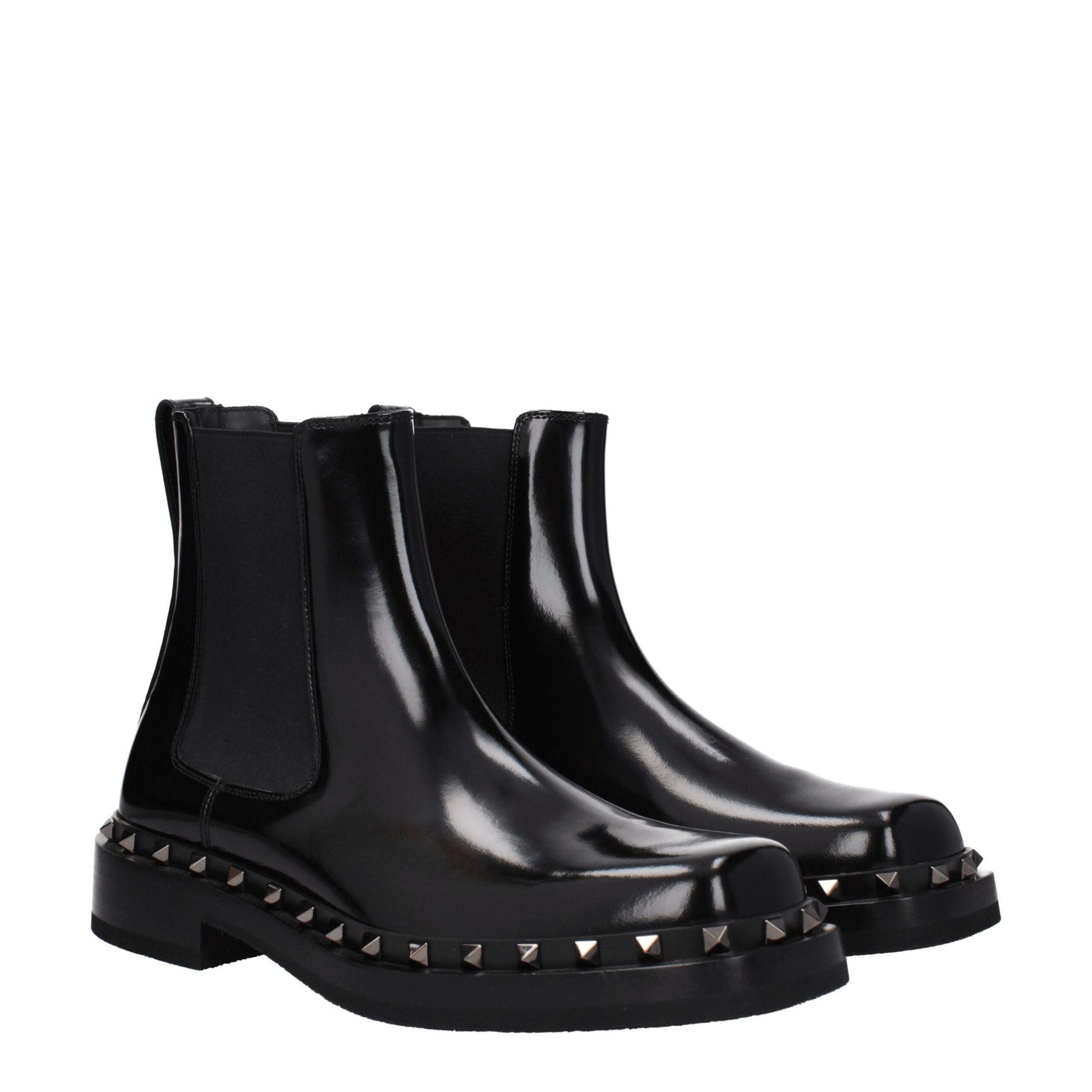 Low-Heel Ankle Boots by Valentino Garavani for men in leather & rubber black & silver features an enchanting design from the Men's Leather & Rubber Low-Heel Ankle Boots collection, highlighting a enchanting 3-5-cm-heel low-heel and round toe style for a refined look.