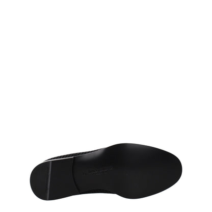 Flat Loafer Slip-On Shoes by Dolce & Gabbana for men in black features an dynamic silhouette from the Men's Leather & Velvet Flat Loafer Slip-On Shoes collection, defined by a dynamic round toe style and flat for a dynamic look.
