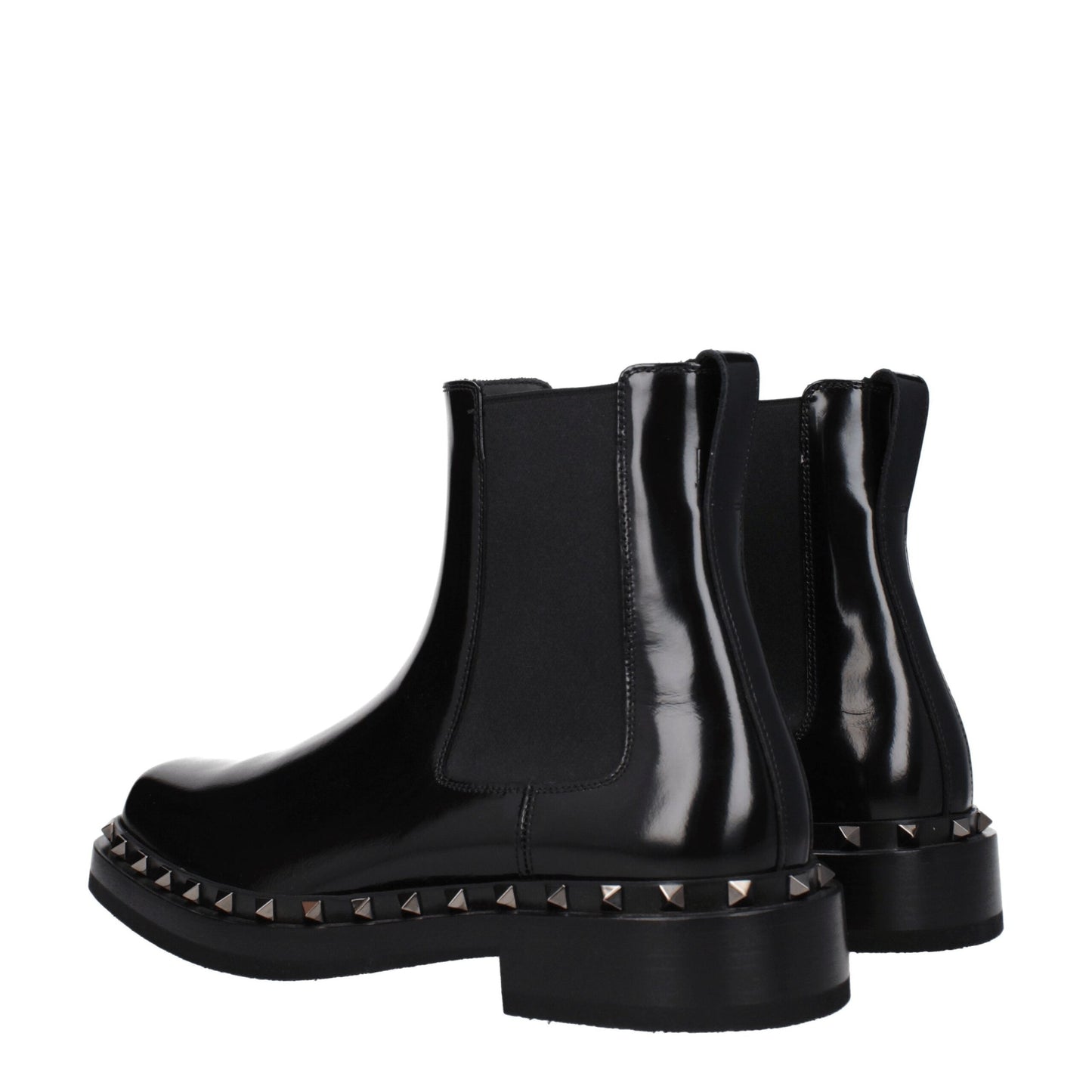 Low-Heel Ankle Boots by Valentino Garavani for men in leather & rubber black & silver features an high-performance silhouette, showcasing the sophisticated design of the Men's Leather & Rubber Low-Heel Ankle Boots with a 3-5-cm-heel low-heel and a refined round toe style.