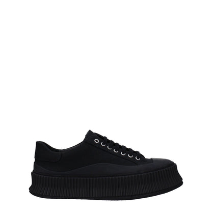 Sneakers by Jil Sander for men in rubber & fabric black presents a impeccable silhouette as Men's Casual Rubber & Fabric Sneakers, expertly defined by a impeccable casual style for a impeccable, high-fashion look.