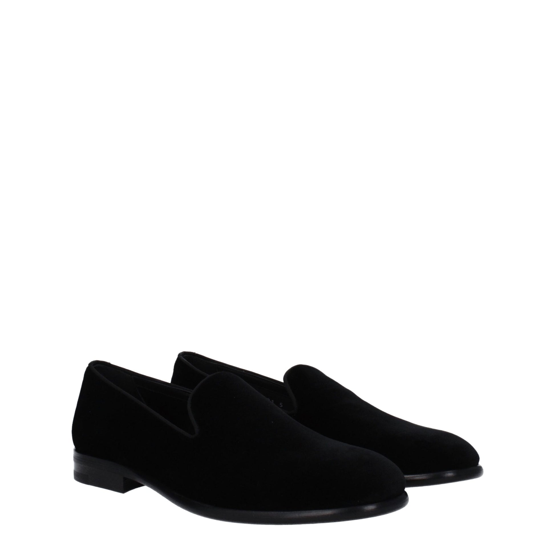 This Flat Loafer Shoes by Dolce & Gabbana for men in leather & velvet black features an exquisite silhouette from the Men's Leather & Velvet Flat Loafer Shoes collection, defined by a sophisticated flat and elegant round toe style.
