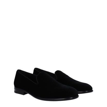 This Flat Loafer Shoes by Dolce & Gabbana for men in leather & velvet black features an exquisite silhouette from the Men's Leather & Velvet Flat Loafer Shoes collection, defined by a sophisticated flat and elegant round toe style.