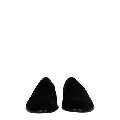 Flat Loafer Shoes by Dolce & Gabbana for men in leather & velvet black features an ergonomic silhouette, perfectly showcasing Men's Leather & Velvet Flat Loafer Shoes with its distinct flat and elegant round toe style.