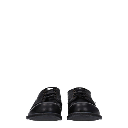 Flat Lace-Up Shoes by Dolce & Gabbana for men in leather black features an dynamic silhouette from the Men's Leather Flat Lace-Up Shoes collection, defined by a dynamic round toe style and flat for a dynamic look.